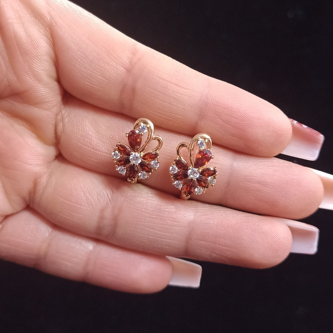 Aretes Diseño Flor Tono Cobrizo